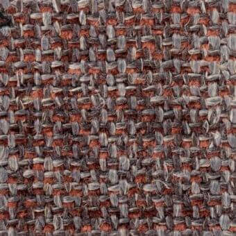 Woven fabric texture, muted gray and rusty orange, dense irregular pattern with visible horizontal and vertical threads, verzelloni Colorado 17009.